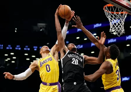 Nets let third quarter lead slip, still topple LeBron-less Lakers, 121- 104